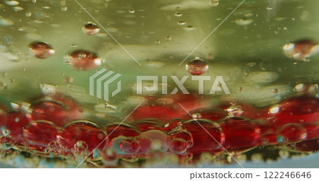 Sinking bubble. Diffusion gel. Colored ingredient bottom. Mixing liquid component changing lighting tones. Underwater macro scene chemical process. Sinking bubble. Diffusion gel. Colored ingredient bottom. Mixing liquid component changing lighting tones. Underwater macro scene chemical process. 122246646