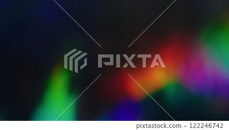 Blurry holographic. Abstract vivid. Defocused leak multicolor green yellow rays rainbow flickers gradient beam lens flare on art black dark background. 122246742