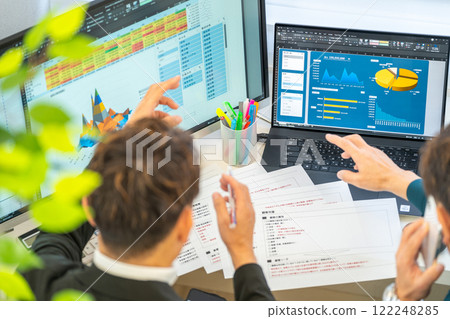 Male engineer business plan analysis graph businessmen 2 people Male engineer business plan analysis graph businessmen 2 people 122248285