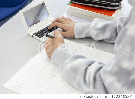 Male students taking classes Male students taking classes 122248587