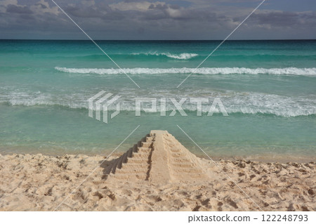 Pyramid of sand on the shores of the Caribbean Sea. Pyramid of sand on the shores of the Caribbean Sea. 122248793