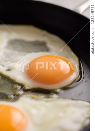 fried egg on the frying pan fried egg on the frying pan 122249751