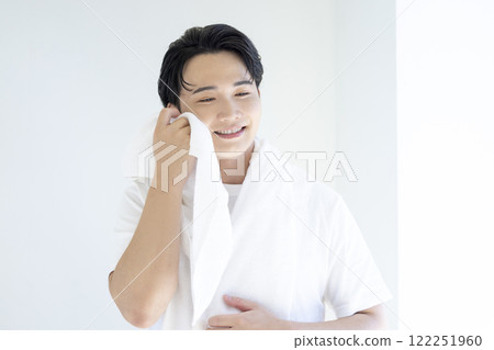 Beauty: Portrait of a young man wearing a white T-shirt Beauty: Portrait of a young man wearing a white T-shirt 122251960