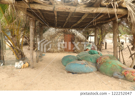 Fishermen Hut in a beach 122252047
