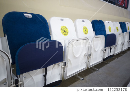 locked chairs at the stadium during the pandemic locked chairs at the stadium during the pandemic 122252178