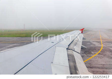 View from the airplane window during taking off on a clear summer morning. Yekaterinburg, Russia 122253417