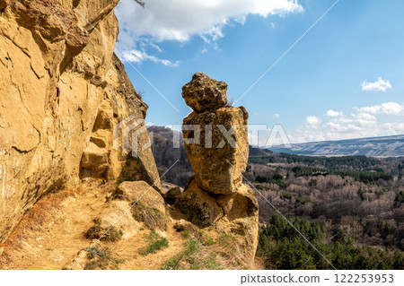 Balancing stones on a rock Balancing stones on a rock 122253953