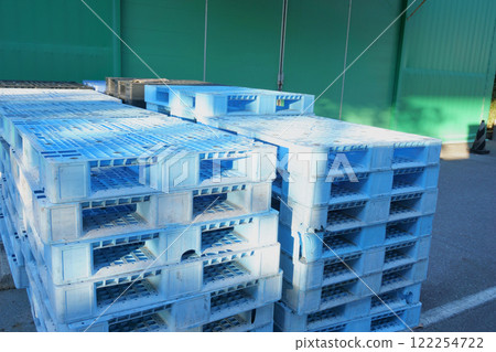 Stacked blue pallets 122254722