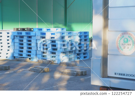 Pallets in front of the warehouse Pallets in front of the warehouse 122254727