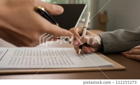 Lawyer and businesswomen discussing and introducing Providing legal advice regarding signing insurance contracts or financial contracts Lawyer and businesswomen discussing and introducing Providing legal advice regarding signing insurance contracts or financial contracts 122255273
