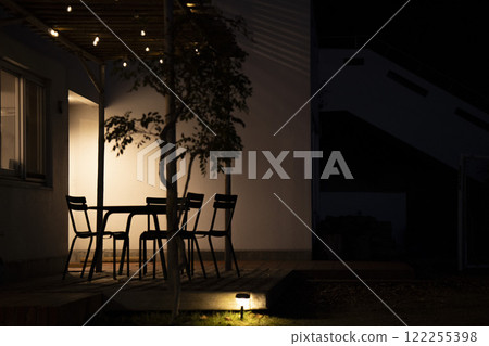The stylish entrance and garden at night when they are illuminated The stylish entrance and garden at night when they are illuminated 122255398