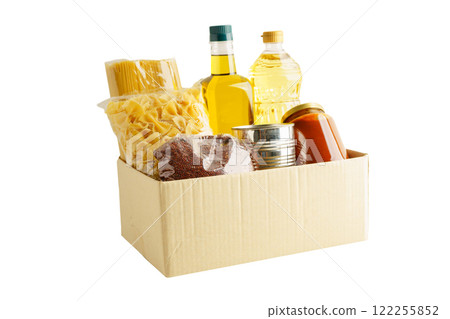 Foodstuffs in donation box isolated on white background for volunteer to help people. Foodstuffs in donation box isolated on white background for volunteer to help people. 122255852