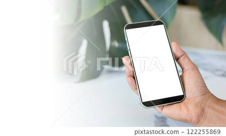 Mockup image screen smartphone, Cell phone with blank space for text, Hand woman work using smartphone, White background for advertising, Marketing, Design, Design creative work space. 122255869
