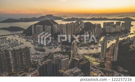 Modern Cityscape Overlooking Marina at Sunset With Urban, HK Jan 12 2021 122257216