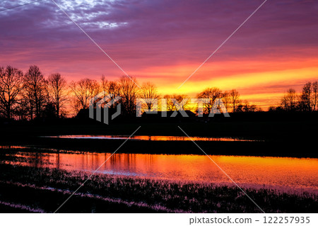 Very beautiful colorful sunset in the spring countryside Very beautiful colorful sunset in the spring countryside 122257935