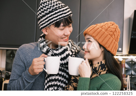Young Asian couple living at home Young Asian couple living at home 122258325