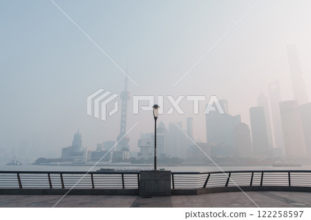 bad Air Pollution in Shanghai City, China. Skyscraper of Lujiazui in Pudong, view from The Bund in the morning. Air Quality Index, AQI, Unhealthy, healthcare concept 122258597