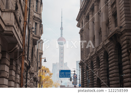 Cityscape view of Shanghai city in the morning. Skyscraper of Lujiazui in Pudong, view from The Rock Bund of Shanghai, China. landmark and popular for tourism attractions. Travel and Vacation concept Cityscape view of Shanghai city in the morning. Skyscraper of Lujiazui in Pudong, view from The Rock Bund of Shanghai, China. landmark and popular for tourism attractions. Travel and Vacation concept 122258599