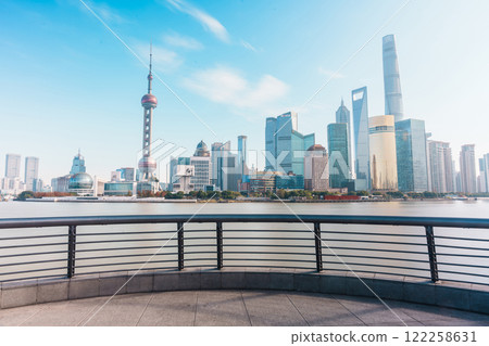 Cityscape view of Shanghai city in the morning. Skyscraper of Lujiazui in Pudong, view from The Bund of Shanghai, China. landmark and popular for tourism attractions. Travel and Vacation concept Cityscape view of Shanghai city in the morning. Skyscraper of Lujiazui in Pudong, view from The Bund of Shanghai, China. landmark and popular for tourism attractions. Travel and Vacation concept 122258631