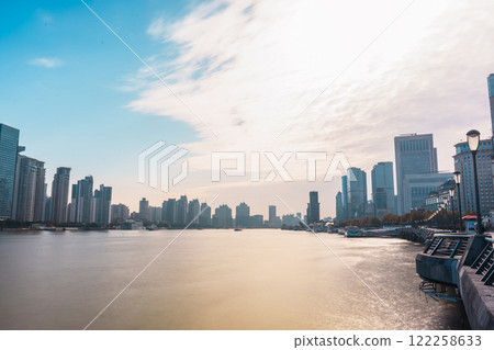 Cityscape view of Shanghai city in the morning. Skyscraper of Lujiazui in Pudong, view from The Bund of Shanghai, China. landmark and popular for tourism attractions. Travel and Vacation concept Cityscape view of Shanghai city in the morning. Skyscraper of Lujiazui in Pudong, view from The Bund of Shanghai, China. landmark and popular for tourism attractions. Travel and Vacation concept 122258633