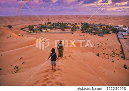 Sunset clouds over the Dubai desert 122259058