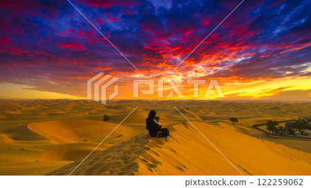 Sunset clouds over the Dubai desert Sunset clouds over the Dubai desert 122259062