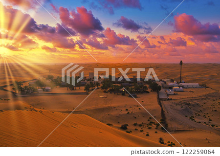 Sunset clouds over the Dubai desert 122259064