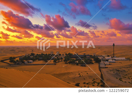 Sunset clouds over the Dubai desert 122259072