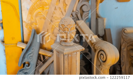 carving element. furniture in classic style. white color wood with gold trim. patina. carving. small depth of field. luxury furniture. use as background. carving element. furniture in classic style. white color wood with gold trim. patina. carving. small depth of field. luxury furniture. use as background. 122259117