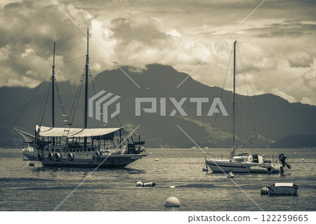 Boats ships and Boat trips Abraao beach Ilha Grande Brazil. 122259665