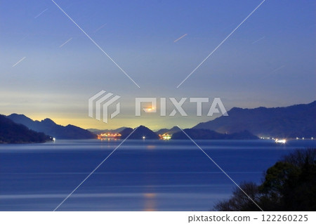 Looking towards Shikoku Tobishima Kaido from Oshiba Island at night 122260225