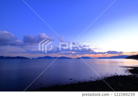 View of the Tobishima Kaido from Oshiba Island at dusk 122260239