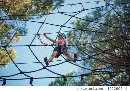 Child in forest adventure park 122260344