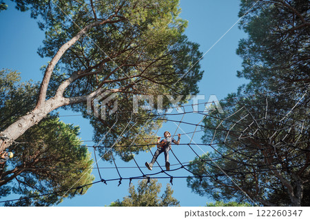 Child in forest adventure park Child in forest adventure park 122260347