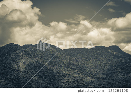 Abraao mountain Pico do Papagaio with clouds Ilha Grande Brazil. Abraao mountain Pico do Papagaio with clouds Ilha Grande Brazil. 122261198