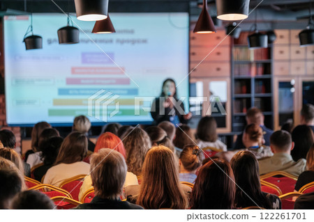 Speaker Presenting to Audience in Modern Conference Setting 122261701