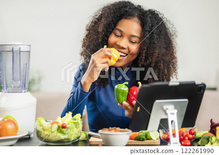 Lifestyle woman enjoys healthy fruit breakfast after yoga training. fitness, nutrition, home lifestyle. 122261990