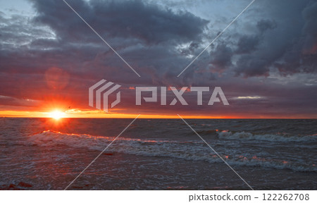 sunset over the sea sunset over the sea 122262708