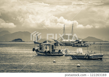 Boats ships and Boat trips Abraao beach Ilha Grande Brazil. 122263169
