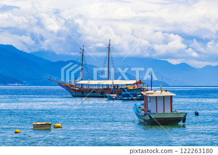 Boats ships and Boat trips Abraao beach Ilha Grande Brazil. 122263180