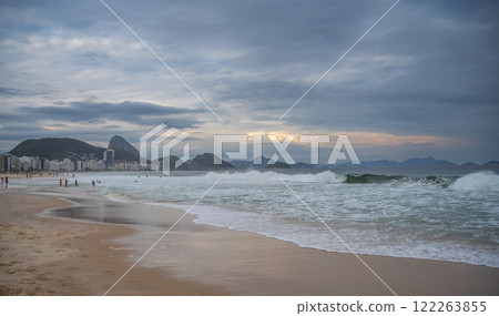 Sunset on Copacabana Beach in Rio de Janeiro. 122263855