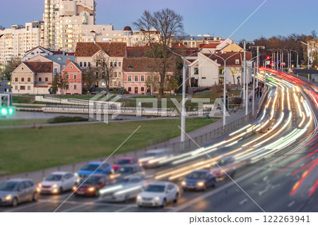 traffic of cars on the road in the evening in the historical center of Minsk 122263941