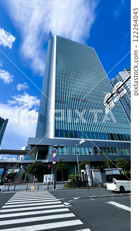 glass building on blue sky background glass building on blue sky background 122264045