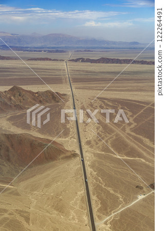 road through the Andes mountains in the Nazca desert. Peru. 122264491
