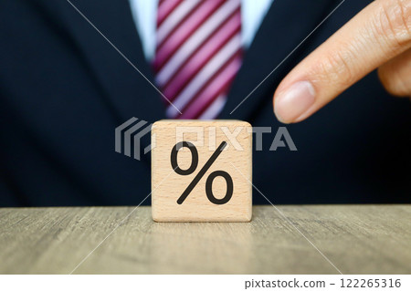Businessman and percent symbol Businessman and percent symbol 122265316
