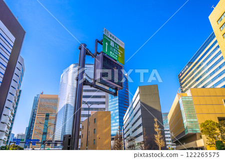 Tokyo cityscape in Japan, including buildings in Shiodome and the Shuto Expressway 300m entrance 18 Shiodome sign (January 2025) Tokyo cityscape in Japan, including buildings in Shiodome and the Shuto Expressway 300m entrance 18 Shiodome sign (January 2025) 122265575