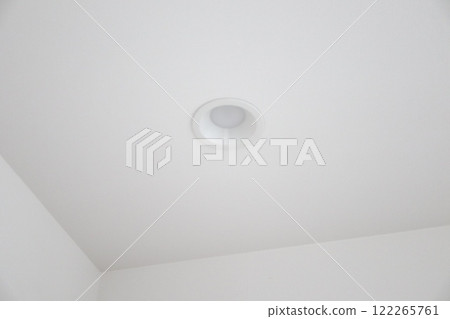 White downlights installed on the ceiling White downlights installed on the ceiling 122265761