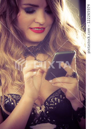 Sexy woman with smartphone Sexy woman with smartphone 122265974