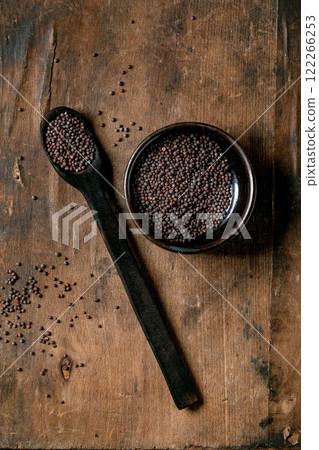 Black mustard seeds for cooking 122266253