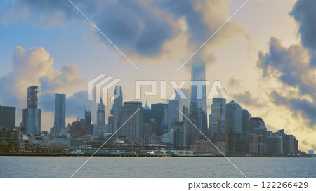 View of New York from the Hudson, evening huge clouds View of New York from the Hudson, evening huge clouds 122266429